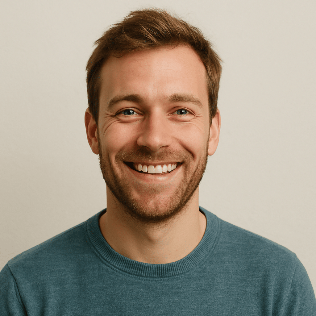 A brown hair young man with a beard called Bert